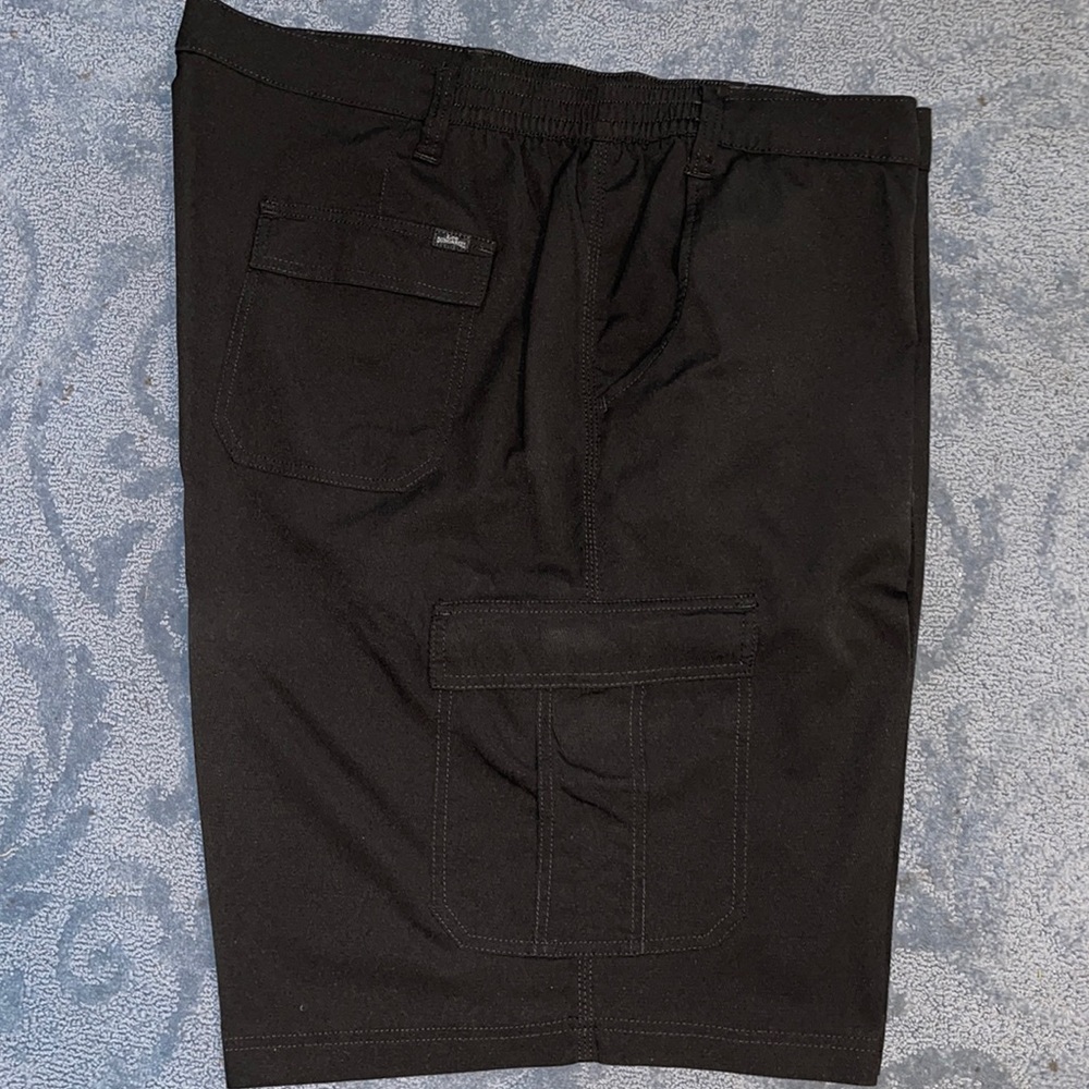 Men’s dress shorts. 100% polyester material. Black color. Size 50 Big/Tall. $30